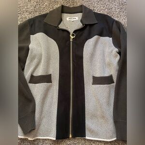 FA 
Fcking awesome 
Jason dill 
Supreme 

Olive black and White Zip-Up Jacket